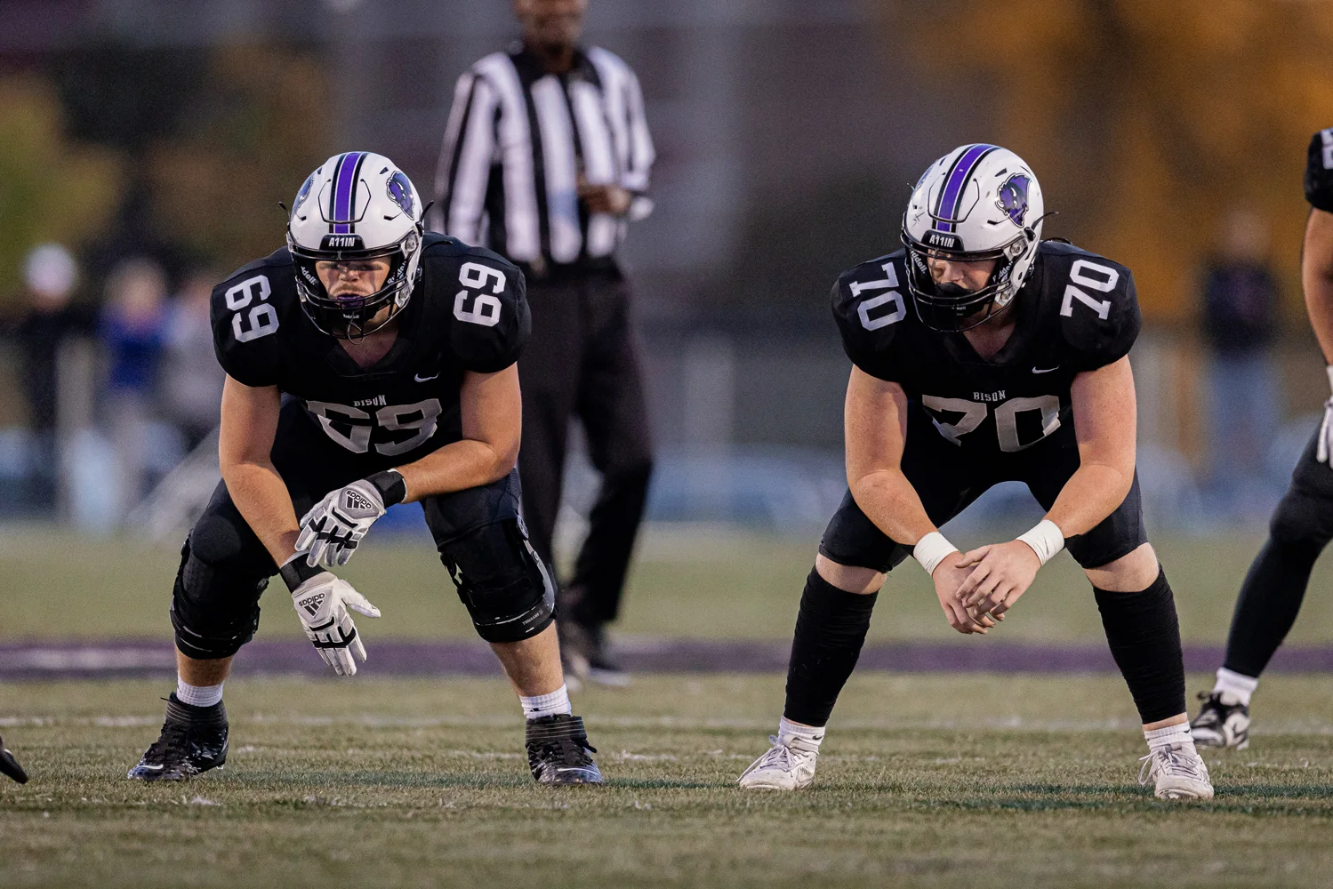 Bison Offensive Lineman in their stance ready for the snap
