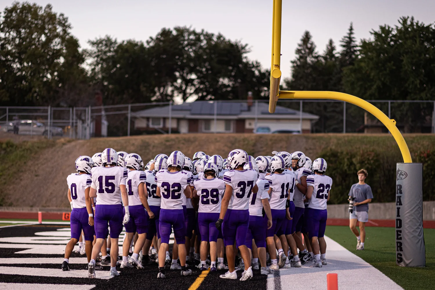 Buffalo Bison in a pregame huddle