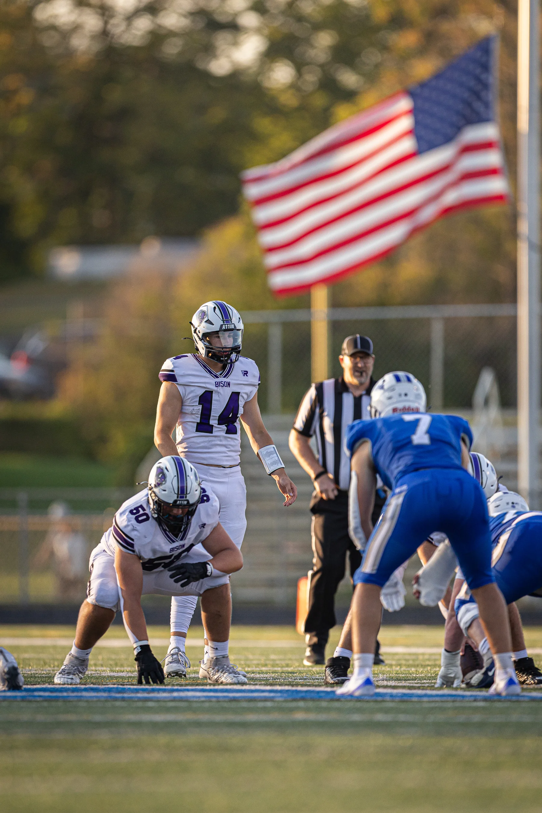 QB ready for the snap of the ball with the offense set<