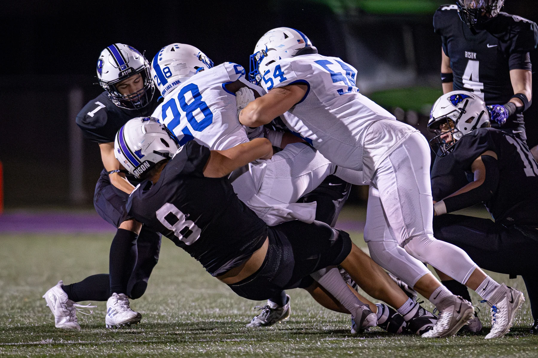 Buffalo Bison defense making the tackle